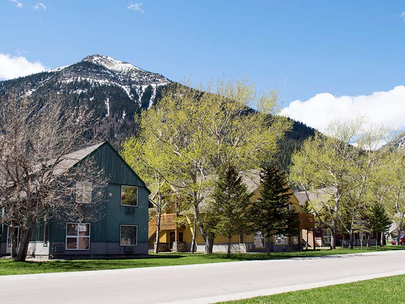 An image of the Waterton Lakes Lodge Resort guest room houses in spring.